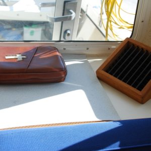 Media 'AC Vent above hanging closet' in album 'Sea Angel view under step entering cabin. The base of the step(kick plate) is sealed to prevent any water from entering the cabin floor area under the 'dry deck'.'