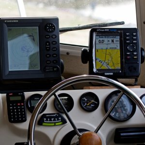 Added Furuno 1715 Radar and Navman F210 Flowmeter (Far Left guage). Fabricated new mount for Garmin GPS/chartplotter. Both units can be swiveled and rotated up and down. Radar and GPS connected via NMEA 0183 interface allowing transfer of NAV DATA and Waypoint Lollipop to Radar.