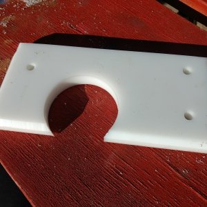 Had this polyboard laying around so I cut it to be the  backing plate.