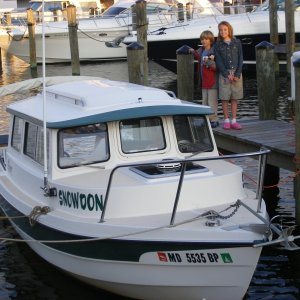 Smallest boat in the marina, but having the most fun
