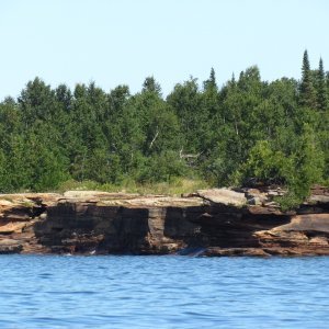 Media 'caves on north end of Devils Island' in album 'Trailer width nazis'