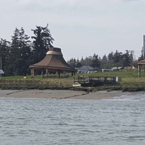 A view across the channel of the Swinomish tribe's "cedar hats"
