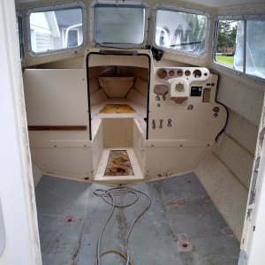 The cabin is stripped, all fasteners removed and holes enlarged. All holes filled with thickened Epoxy prior to paint. Core looked great in the cabin,