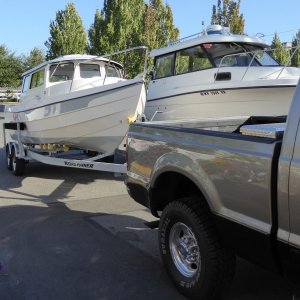 In line at Edmonds launch, next to a Trophy 24.