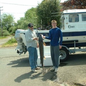 Jr Buckwheat and some grumpy fart with the catch of the day...Warrenton, spring 03