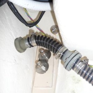 Media '7. Second non-return valve on bildge pump discharge, closer to the outside. Our cockpit and bildge pump well is dry, unless we purposely introduce water to this area.' in album '1. Spring Line storage'