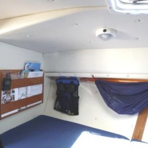 Media '14. Extra storage in Cutty.
You can just make our the top end of one of our wooden boat paddels, held up in place under the deck by a velcro strap.' in album '1. Spring Line storage'