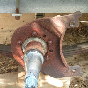 Media 'Old rusted backing plate that held caliper (Kodiak).' in album '7 yr old rotor, steel.'