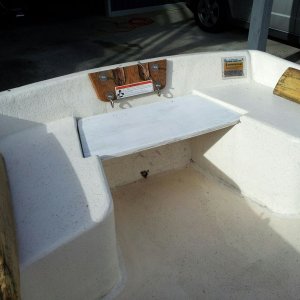 rear plywood filler lifts out and transom board notched for outboard clamps