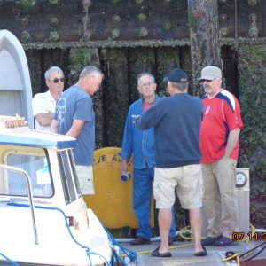 Early Friday morning, guy talk on the dock.