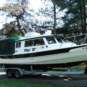 Media 'Winter camper package both screens and window with lots of views' in album '(Stanley-J) After a 19 hour trip home from St. Louis. I had to cut a tree  down to get the boat in the driveway...great planning"'