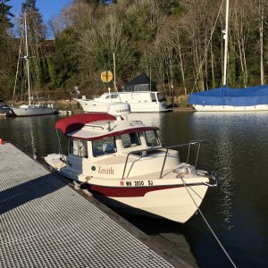 Home for the night in Cathlamet.  The gold thing above my boat is a radar reflector on the end of my boat pole.