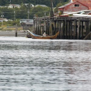 The local ferry.  The house on pilings behind the canoe (with a broken down plane next to it) was interesting.