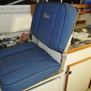 Had the helm seat reupholstered with high density foam.  $$$
