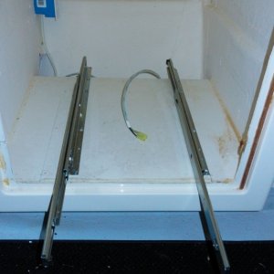 I used what are called \"pantry slides\" to go underneath the drawer platform.