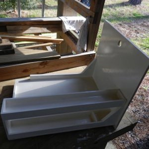 Media 'Here is the drawer painted and almost ready.  As I was measuring things, there were a few extra inches on the side of the cooler - I couldn\'t let that go to waste!  I made some shelves for storing cans alongside.' in album 'This was the standard Norcold install under the copilot seat.'