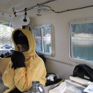 Robbin trying to get the Wallas to warm her up after morning hike.