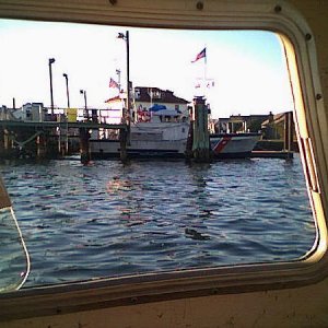 Brant Point CG Station and 47 foot patrol boat guarding INN THE WATER