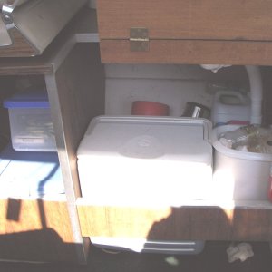 Area under galley and helm seat. Much work still to do.