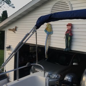 Here the bimini is in the back position.  Just a storage position when on the water and no need for the bimini to be opened up.