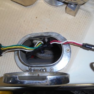 I would have preferred to use this port to add a second rode, but, alas, no room in the anchor locker.  I water proofed the port and added a connector for the remote anchor control and for 12v charge from the tow vehicle.