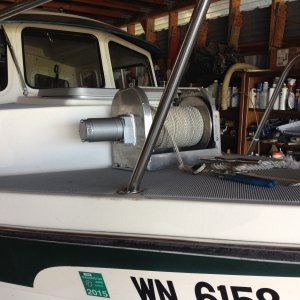 bolted through the deck with 4 5/16 stainless bolts