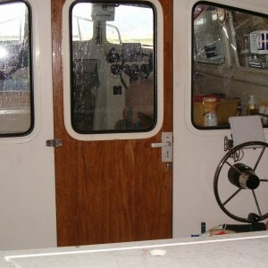 Media 'Rear Ultraflex Bulkhead Helm and 8 HP engine controls' in album 'I have ran boats most of my life past the age of 19 years old. Nothing bigger than 52 feet but commercial fished all over SE Alaska and the Washington Coast and Straits of Juan De fuca. I have to tell you that these little C-Dories are one tough boat. I have had my 22 out in the Straits sometimes when I had most assuredly had rather not been there. There hasn\'t been one time when I felt like I didn\'t have control over the boat. Not too sure about Lori though. I remember one time she looked over at me and said,\"this ain\'t going to roll over is it\" I will have a little trouble giving up boating as we have known it, but Lori will turn 84 on her birthday and I guess it\'s time to do some changes. Putting the Lori L up for sale is not going to be easy.'