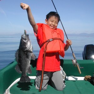 Sieku 2006 - Newphew with his first Black Sea Bass (AKA Black Rockfish)