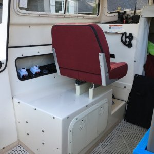Control panel near the port seat.  The house battery and charger are below the seat.