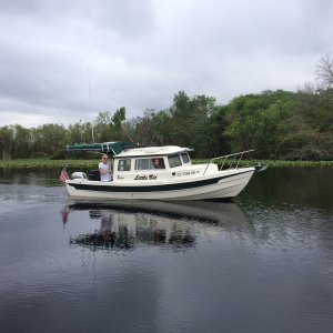 Our second sighting pre gathering. Barb and Scot on Little Bit, hailing from Colorado. At this year\'s gathering out of state boats outnumbered Florida boats 12 to 9