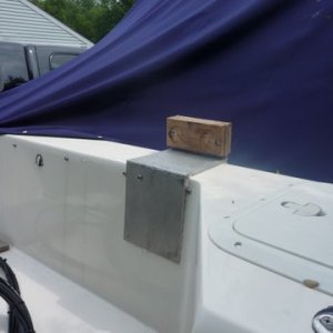Media 'pic from the motor well side. bolted red oak recessed stainless bolts cut out recessed circles with a hole saw and then used a wood chisel to remove wood so the round part of the dink motors clamp sits in the round recess. The little sucker 2.5 Yamaha 37 pounds rode here on our portion of the Maine Cruise never moved. Note snap on the plate reinstalled for the rear curtain for our camper top.Now through bolted to prevent any movement and to prevent motor from being taken by just lifting off bracket.' in album 'Junior our 2 1/2 hp Yamaha four stroke dink motor. Bracket through bolted into the compartment with just one bolt.'