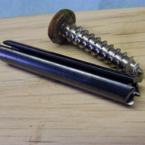 Used a product called "Unscrew-Ums" to remove broken off screws. It worked very well.