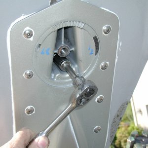 Remove the"hidden bolt" first. All bolts are 14mm (9/16").