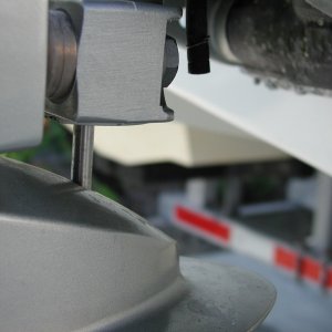 The black tube is the speedo tube. Disconnect it BEFORE dropping the lower case.