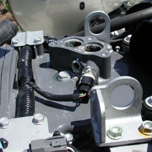 On the Port engine, I had to drill out the salt from this housing with a 1/4" drill! Salt deposits are visible in the Thermostat mounting areas.