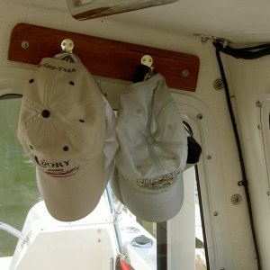 Teak base with brass hooks for hats, keys, etc.