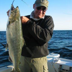My first salmon, a 15 pound King caught in Lake MI with Mark on Not For Hire