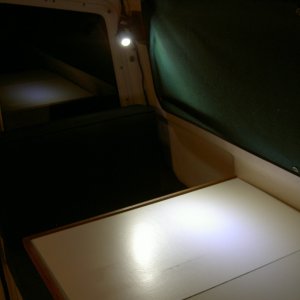 LED light illuminating table.  No flash.  Note: main cabin lights have 9 LEDs each and were purchased from www.sailboatstuff.com