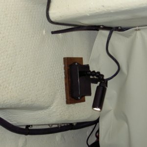 LED reading light in v-berth to starboard.  It has 6 LEDs and is plenty to illuminate the area.  One is also mounted to port.