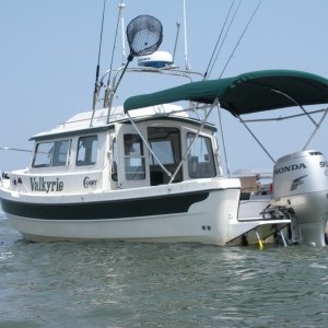 Anchored off East Harbor State Park in three feet of water for a swim to the beach.