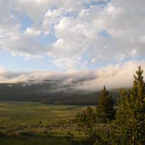 Evening clouds moving into the Big Horns, with a coming temperature drop of about 20 degrees.
