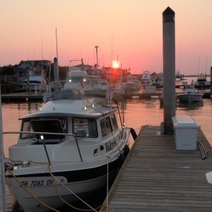 Sunset. Edisto Island, NC.  Note reflective tape on portions of the boat.  Intent is to make Valkryie easier to find in an anchorage or if a tow is needed on a dark and stormy night.