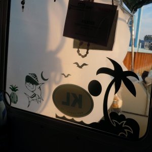 Reminder of places that we have been.  They also make interesting shadows on the galley.