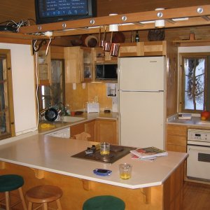 The interior was never finished by the gentleman that built the cottage.  He never stayed in the cottage and only had a few chairs inside. The Cottage now has all the modern items in a 500 sq ft package.