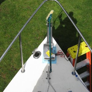 Media 'using broom handle as strait edge to be sure I'm lined up' in album 'testing fit Lewmar Pro Series 700H.   Kerri On'