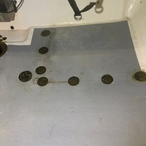 Filling all the holes with fiberglass resin.