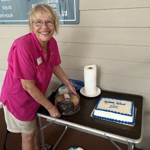 Cohost Joyce cutting our cake!