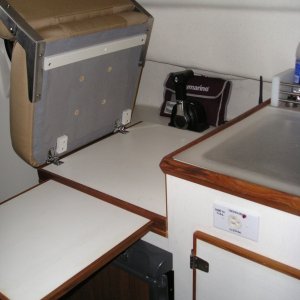Media 'Hinged removable helm seat, slide out counter board, and 1000 W inverter outlet' in album '1000 W inverter'