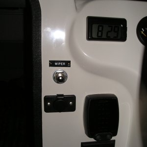Starboard momentary sw. for wiper. Bennett trim tab sw. and indicators.