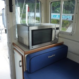 Microwave/convection oven/broiler.  Powered by inverter or generator when shore power unavailable.